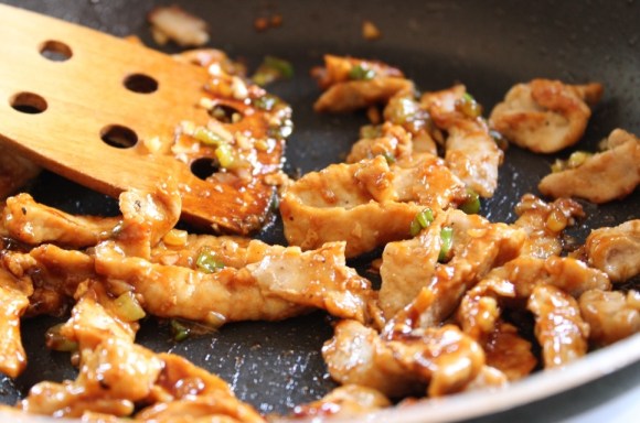 How to Make Hoisin-Glazed Pork Wraps (Step 3: Coat Cooked Pork with Sauce)