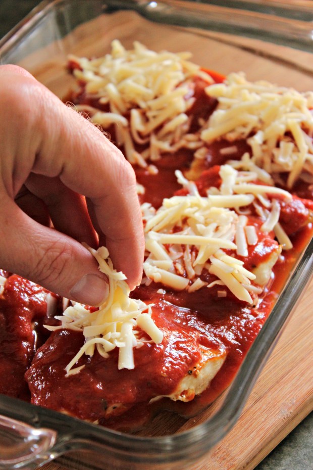 Pan-Seared Chicken Parmesan topped with sauce and mozzarella cheese