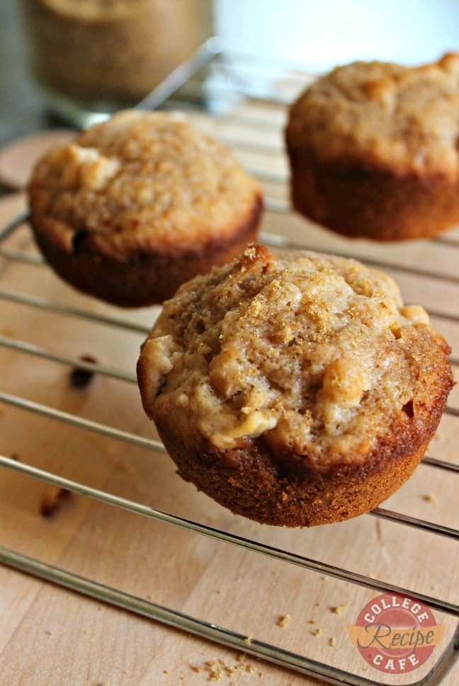 Freshly baked Apple Cinnamon Muffins on baking rack.