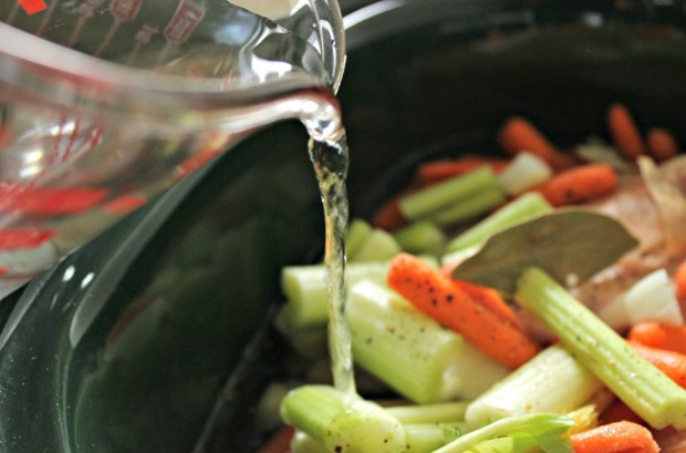 Just add water to make chicken broth in the slow cooker