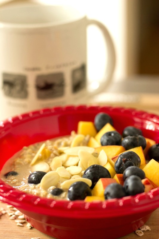 Peach Berry Overnight Oats with a Coffee